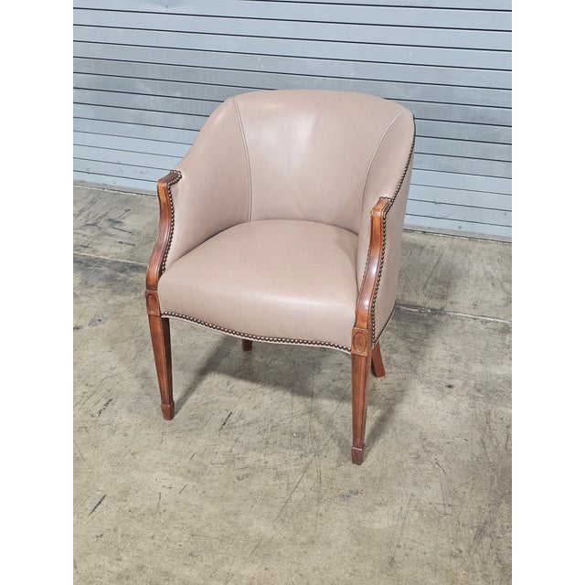 Store Item: Taupe Leather Club Chair with Mahogany Frame Description: Comfortable Mahogany Framed Club Chair with padded...