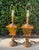 Beautiful matching pair of vintage table lamps featuring richly finished turned wood, decorative carved details, antique...