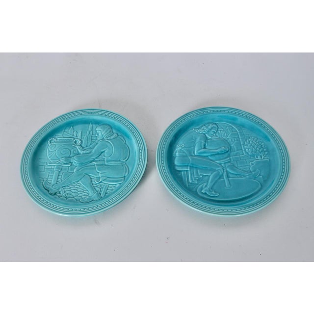 Pair of 1939 World's Fair Homer Laughlin Glazed Ceramic Souvenir Plates. Featuring two Aqua, glazed, smoothly textured...