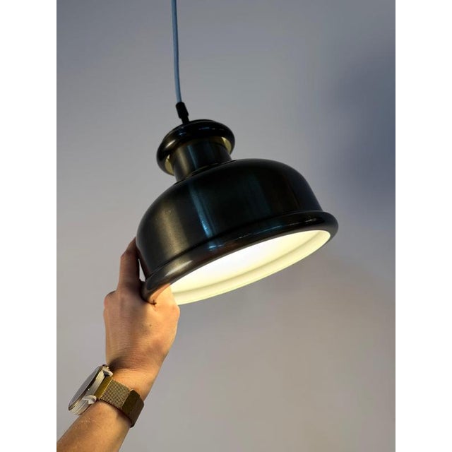 A rare exception in the portfolio: the country line pendant lamp was designed in 1976 by renowned designer sidse werner...