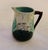 Antique Majolica Creamer Pitcher, Embossed in Earthtone colors with green leaves, flowers and fern. Measures 4"tall, 3.5"...