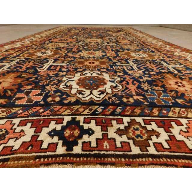 Antique hand-knotted Caucasian rug. 5'x 9'