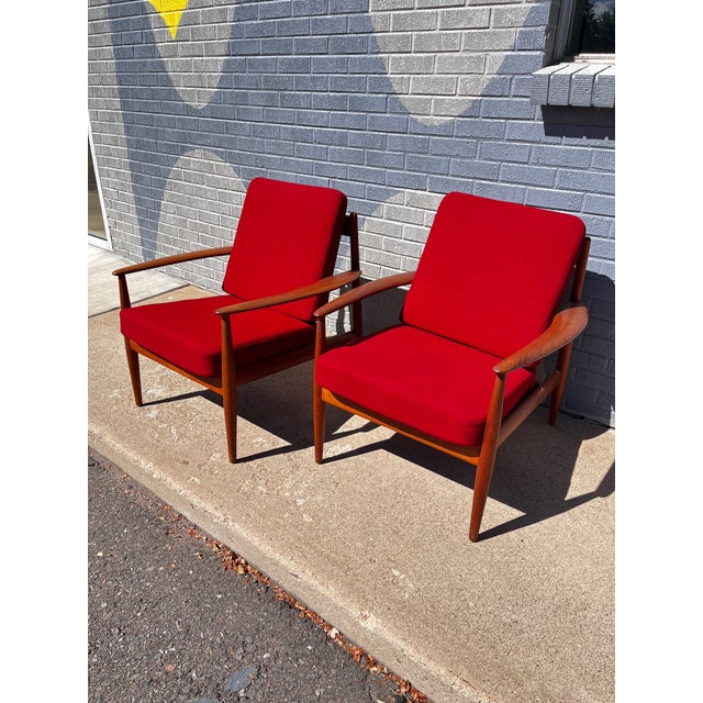 Grete Jalk for France & Son Teak Lounge Chairs, Pair, Denmark, 1960s Elegant pair of Danish Modern lounge chairs designed...