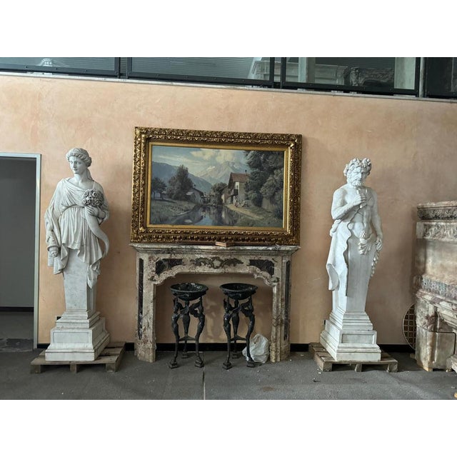 Spectacular pair of monumental marble sculptures depicting figures from Greek mythology, masterfully carved in Italian...