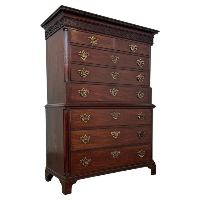 A superb 18th-century English chest on chest, finely crafted from richly figured mahogany in the Chippendale style and...