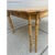 Offered is a vintage chinoiserie style dining table with two extension leaves. This piece features chic faux bamboo...