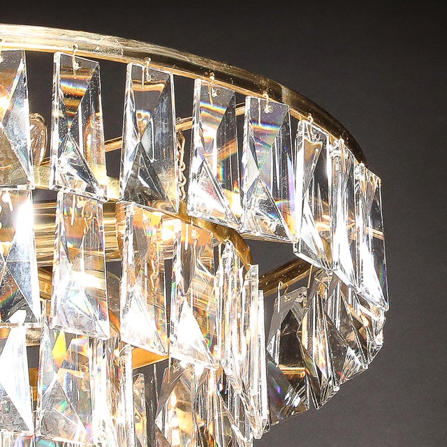This stunning three-tier chandelier, crafted in Austria circa 1970, captures the essence of Mid-Century Modernist...