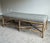 Exceptional McGuire Furniture “Cat’s Cradle” bench designed by Barbara Barry, featuring the iconic rattan-form frame with...