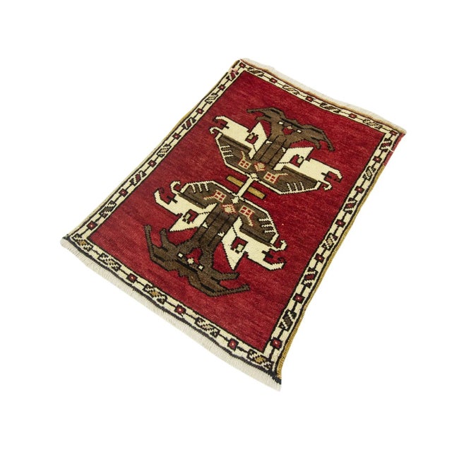 Vintage Handknotted decorative mini rug from Kars region of Turkey. Approximately 45-55 years old. In very good condition.