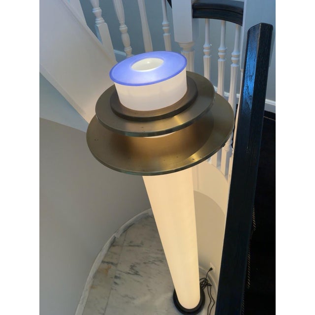 A dramatic custom illuminated column floor lamp by Donovan Lighting, Ltd. The sculptural design features a tall glowing...