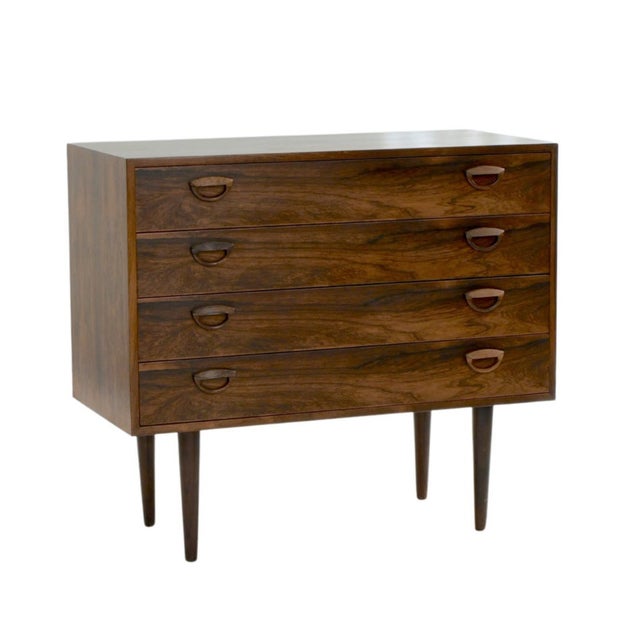 Beautiful 1960s four drawer chest in rosewood by Kai Kristiansen for Fm Møbler, Denmark. This chest is in good vintage...
