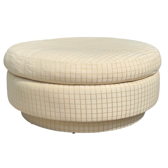 A striking vintage postmodern cocktail ottoman featuring a sculptural stacked cylindrical form with a recessed plinth...