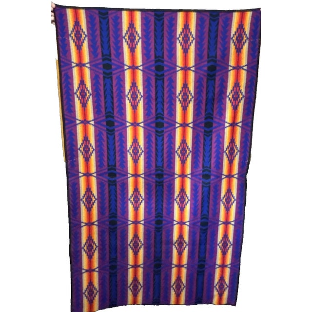 This rare and unusual Pendleton saddle blanket comes with a leather accent on each side. Gorgeous purples pinks and blues....