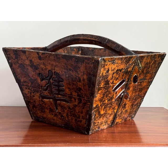 A striking antique Chinese provincial carrying basket or utility container, likely dating to the late Qing or early...