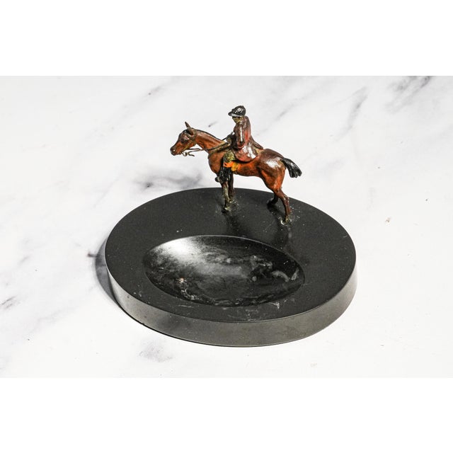 A delightful blend of sporting elegance and refined craftsmanship, this antique Austrian desk or dresser catchall...