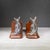ABOUT A vintage pair of hand crafted bronze plated Scotty Dog bookends on wooden pedestals with original green felt....