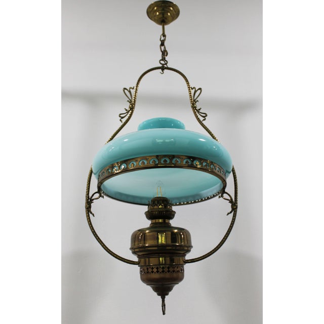 L&B (Lempereur & Bernard) stamped chandelier, a former oil lamp converted into an electric pendant light. The gilded metal...