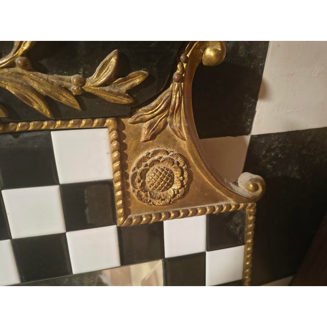 This is a gorgeous 1991 carvers guild black and white tiled wall mirror.desiened by carol canner and crafted by fred...