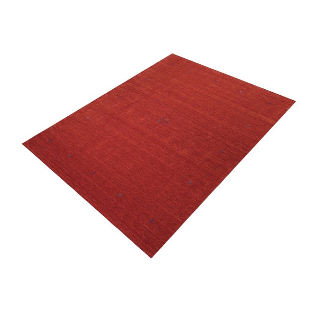 Make a bold statement in your living area with this exquisite Contemporary Gabbeh Wool Rug. It is meticulously hand-...