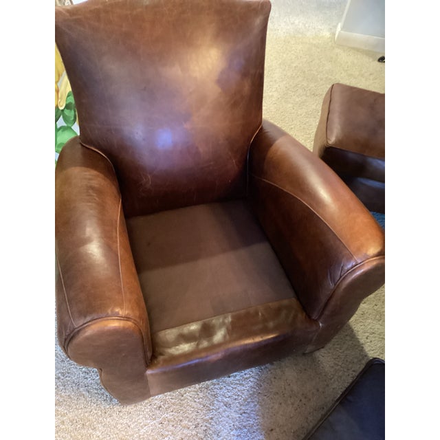 Mitchell Gold for RESTORATION HARDWARE quality leather chair and ottoman. The chair is incredibly comfortable and rustic...