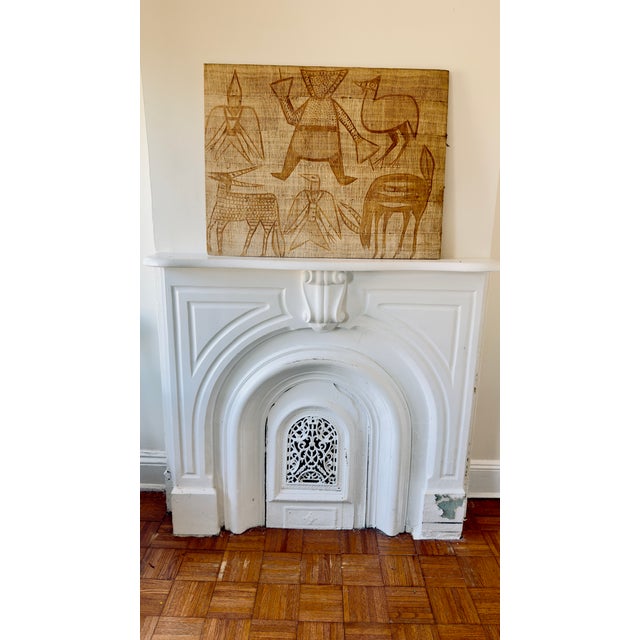 Vintage African textile panel in neutrals mounted on a wooden board, handwoven from natural raffia palm fibers. Features...