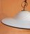 Elegant pendant lamp with a vintage design, crafted from hand-blown Murano glass in a milky white color with a black...