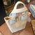 A Vintage 2000s Chanel Beige Canvas Tote Bag in Excellent Condition For Sale - Image 11 of 17