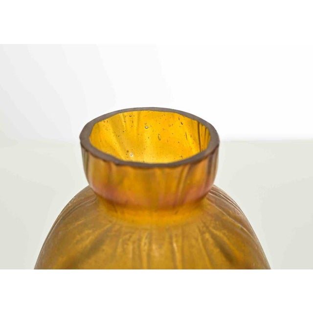 Art Nouveau bohemian iridescent orange vase, realized in the early 20th Century. Excellent condition.