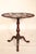 Antique George II style mahogany supper table, 19th century. The top with 9 outer circular recessed areas for plates...