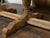 A French bleached oak farm table from the 19th century, with trestle base, baluster legs and weathered patina. Created in...