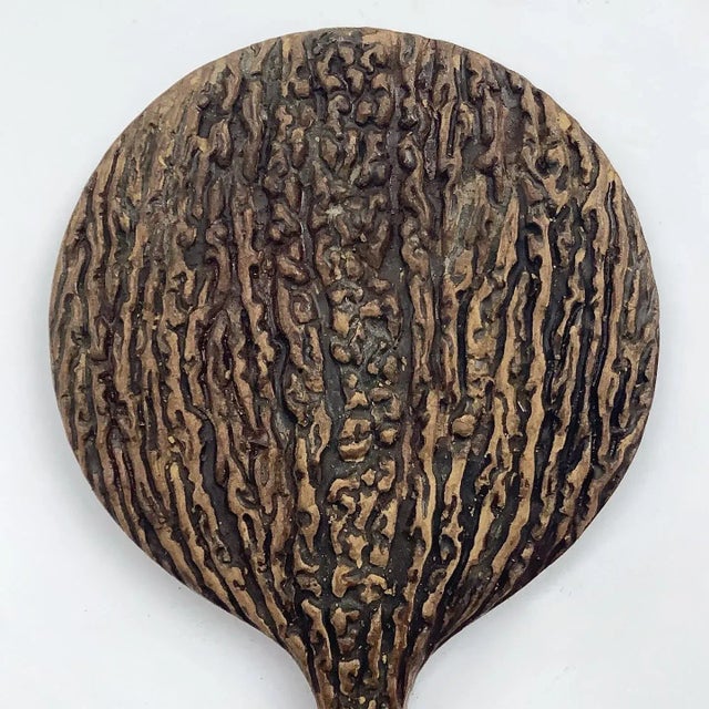 Circa 1800s composite faux antler hand mirror with original beveled mirror. Hand mirror has discolorations, edge cracks.