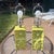 California Pottery Chartreuse (fun color) pair of boudoir lamps that has pretty three dimensional floral bases. They are...