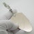 Acquired from the renowned historical jewelry shop Presta in Naples, this solid 800 silver miniature cake server embodies...