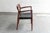 Side chair ‘model 56’ designed by Niels Otto Moller and produced by J.L. Moller in Denmark during the 1960’s. This captain...