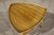 Guitar pick table made by John Widdicomb. Simple midcentury design with an elegant finish. Rounded edges and sculpted leg...