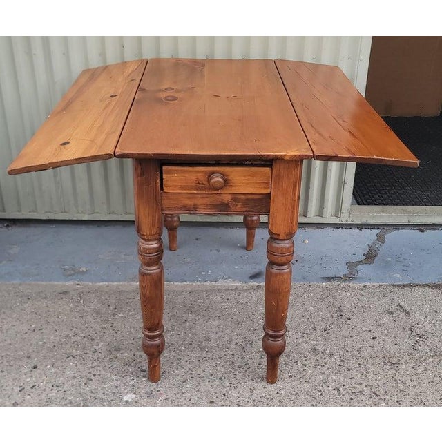19thc Drop Leaf table Each leaf adds 10 inches in length to the side with both leafs up the table measures 40wide x 39deep...