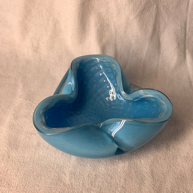 This is a mid-century vintage Alfredo Barbini Murano turquoise blue bullicante art glass bowl featuring controlled bubbles...