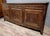 Important louis xv period sideboard in solid carved oak, circa 1750 the front opens with three doors and three drawers...