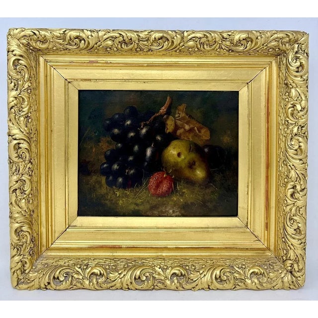 An exceptionally fine quality example of an elaborately framed English Still Life of fruits Oil Painting on canvas, in the...