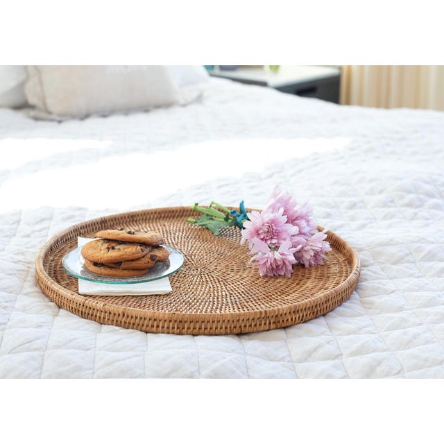 Our hand woven rattan round flat trays offer a great way to both decorate and protect your table. These trays are easy to...