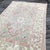 A Distressed Antique Turkish Rug with Soft Geometry and Floral Balance This antique Turkish rug is hand-knotted in the...