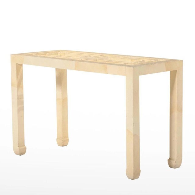 Late 20th century faux goatskin table of ivory lacquer made in the Hollywood Regency chinoiserie style. Size is suitable...