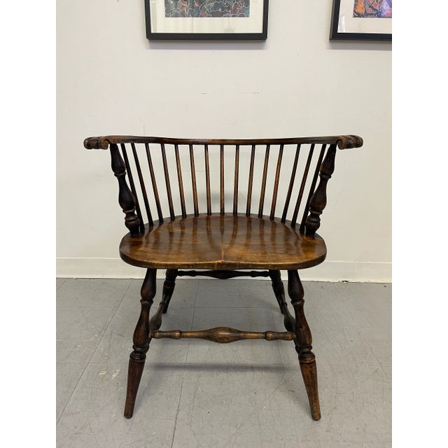 Low Comb Pub Chair. Turned Leg. Rich Petina to the Wood. Claw Carvings at the Edge of Each Arm. Vintage Condition...