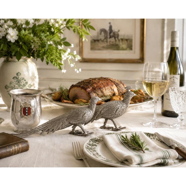 Pair of vintage French pheasant table ornaments dating to the early 20th century. Cast with finely detailed plumage and...