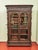 Neo-Renaissance bookcase made of solid oak, richly decorated with hand-carved decor with motifs of leaves, flowers, fruits...