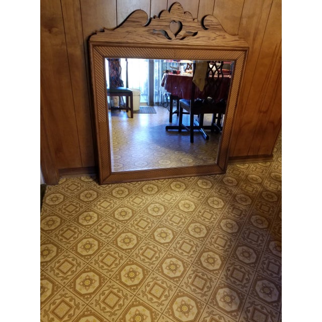 Antique oak and beveled mirror. 49 H 42 W