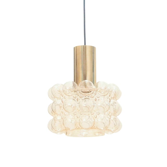 Stunning mid-century ceiling light by Helena Tynell for Limburg (Germany, 1960s/1970s). The hand blown bubble glass shade...