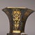 A matched pair of slender archaistic Chinese bronze beaker vases (*gu* 觚), the ritual wine vessel form of the Shang and...
