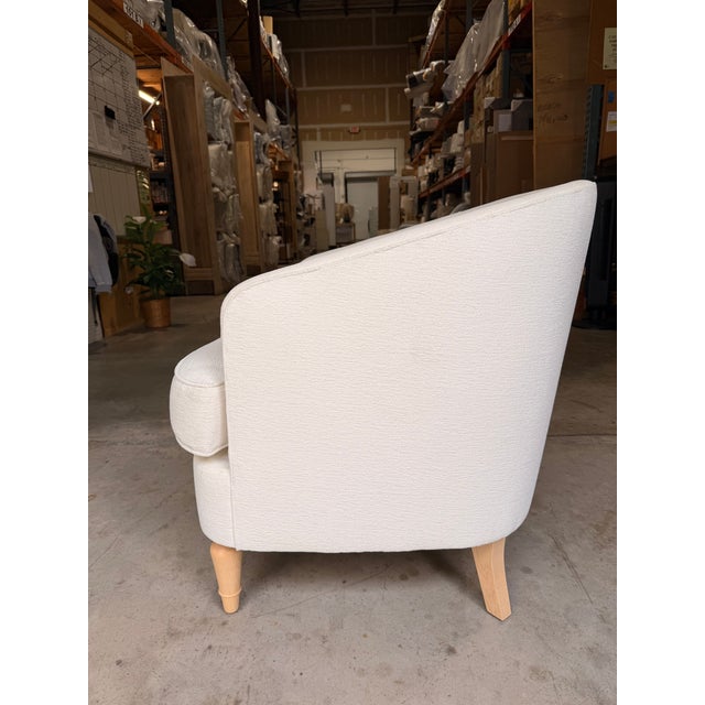 Contemporary accent chair featuring a softly curved silhouette and a fully upholstered frame for a clean, inviting look....