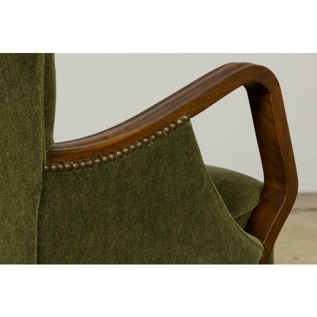 Exceptional pair of Danish Art Deco lounge chairs designed by Alfred Christensen, dating to the 1940s and sourced in...